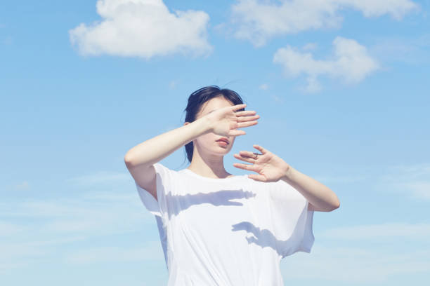 Outdoor portrait of single woman in sunny nature