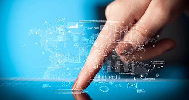 istock Fingers touching tablet with charts 1056346400