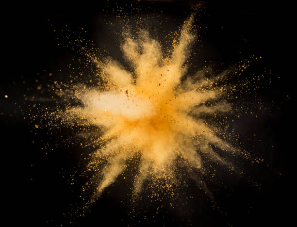 istock Golden powder explosion on black background. 1056355914