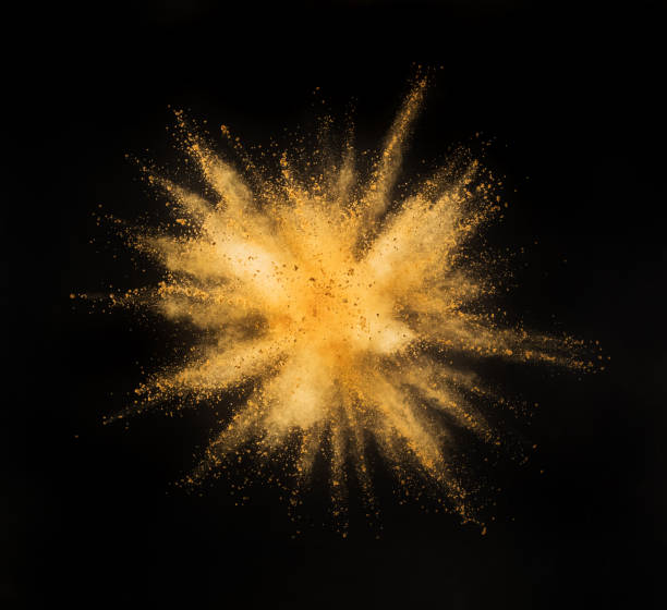 istock Golden powder explosion on black background. 1056355942