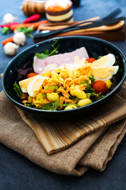 istock Fresh fruits salad and ham with egg 1056356646