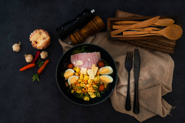 istock Fresh fruits salad and ham with egg 1056356992