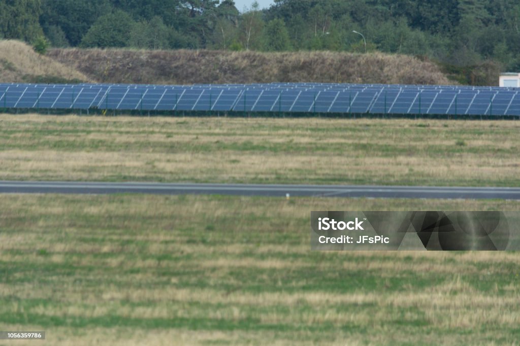 Solar system of Weeze Airport. Panorama of the solar system of Weeze Airport.
The airport uses huge solar parks to cover its own energy consumption. Airport Stock Photo