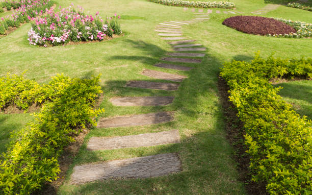 istock Walkway in flower garden. 1056360264