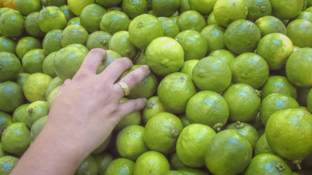 istock beautiful lemons on the market shelf 1056360430