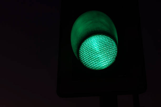 istock Traffic lights - green. Traffic lights with the green light lit. 1056364838