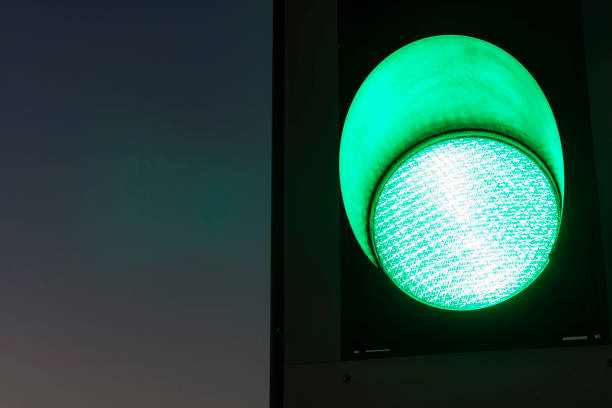istock Traffic lights - green. Traffic lights with the green light lit. 1056364846