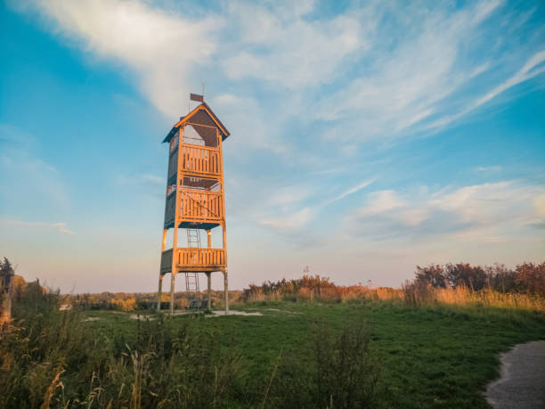 istock tower on mountain ridge beautiful adventurer arrival sky 1056368316
