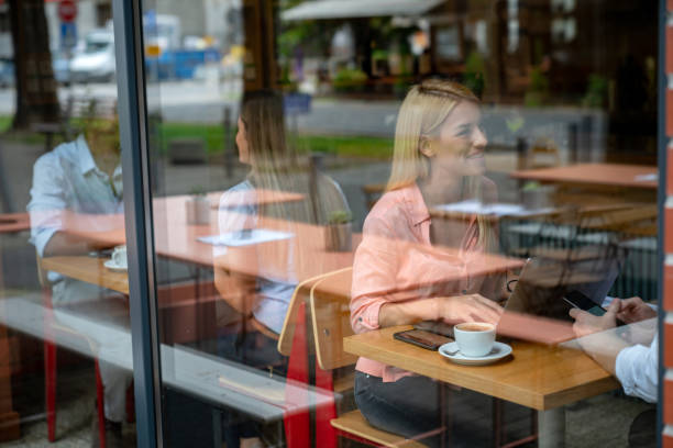 istock People having a cup of coffee at a cafe 1056373006