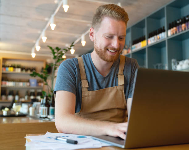 istock Business manager doing the books at a restaurant 1056373326