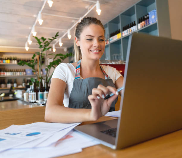 istock Business manager doing the books at a restaurant 1056373364