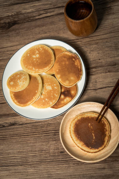 istock dorayaki with wood grain background 1056373486