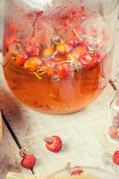 istock Tea with a dog rose. Selective focus. 1056378776