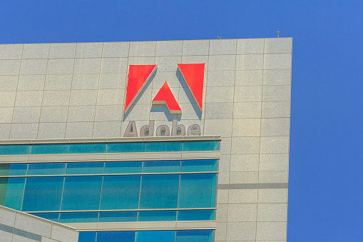 San Jose, California, United States - August 12, 2018: Adobe Logo at Adobe Headquarters. Adobe is leader company of software for graphic, photography, video making and a big microstock agency.