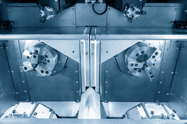 istock The double turret CNC lathe machine or turning machine. 1056382460