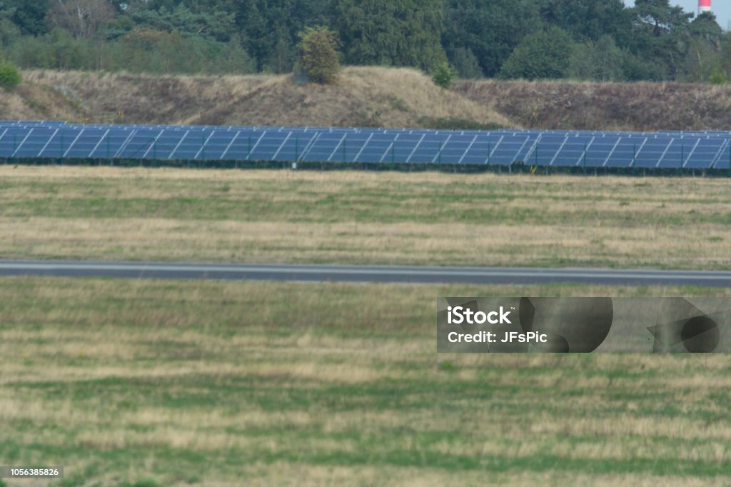 Solar system of Weeze Airport. Panorama of the solar system of Weeze Airport.
The airport uses huge solar parks to cover its own energy consumption. Airport Stock Photo