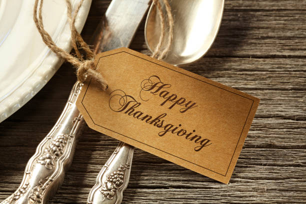 A Happy Thanksgiving Tag On A Thanksgiving Place Setting