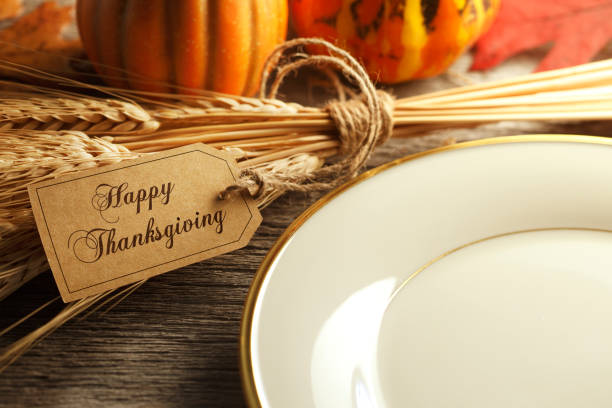 istock A Happy Thanksgiving Tag On A Thanksgiving Place Setting 1056390226
