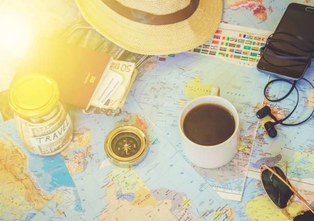 istock Background the journey, the reflection in the Cup of coffee. Map. Selective focus. 1056390752