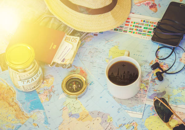 istock Background the journey, the reflection in the Cup of coffee. Map. Selective focus. 1056390768