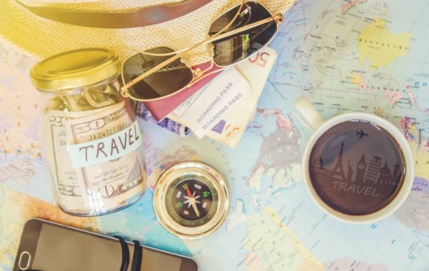 istock Background the journey, the reflection in the Cup of coffee. Map. Selective focus. 1056390794