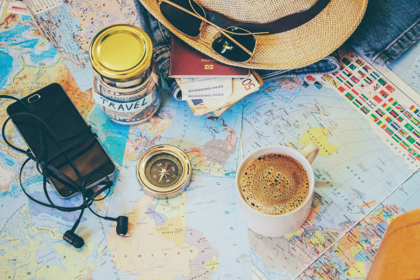 istock Background the journey, the reflection in the Cup of coffee. Map. Selective focus. 1056390834