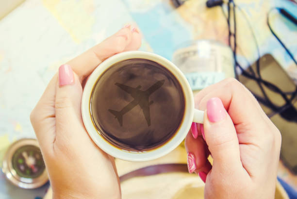 istock Background the journey, the reflection in the Cup of coffee. Map. Selective focus. 1056390990