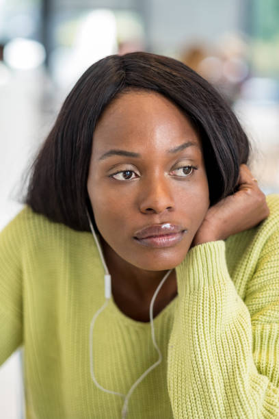 istock Young black woman at lunch 1056392876