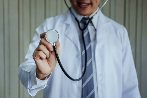 istock The doctor use the medical stethoscope for his work. 1056394482