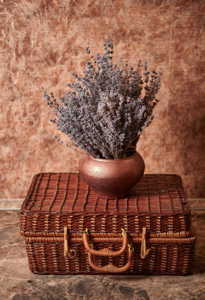istock Vintage pot with Lavender bouquet and basket 1056402658