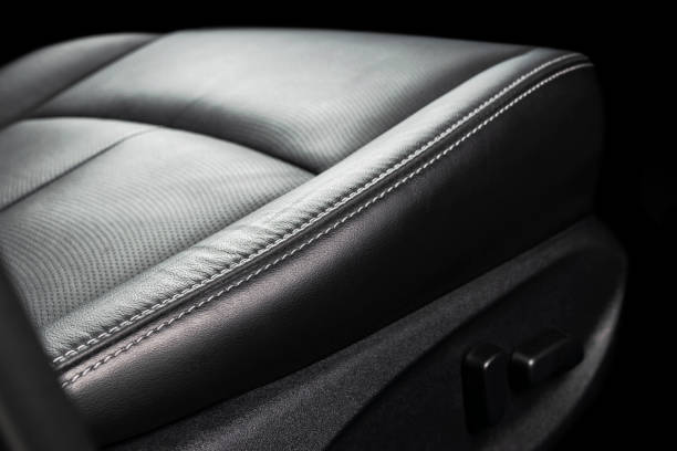 istock Car inside. Interior of a car. Comfortable leather seats. Perforated leather. Car interior details. Car detailing 1056404336