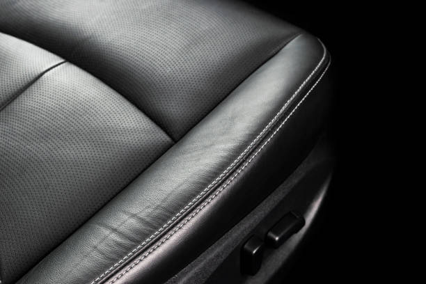istock Car inside. Interior of a car. Comfortable leather seats. Perforated leather. Car interior details. Car detailing 1056404382