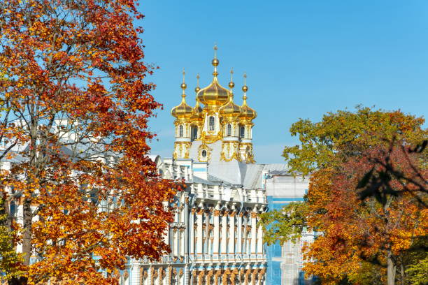 Catherine palace and park in autumn foliage, Tsarskoe Selo (Pushkin), St. Petersburg, Russia St. Petersburg, Russia - October 2018: Catherine palace and park in autumn foliage, Tsarskoe Selo (Pushkin) st petersburg catherine palace palace russia stock pictures, royalty-free photos & images