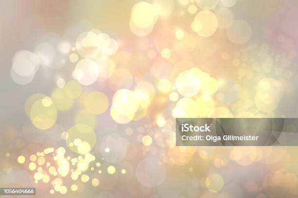 Abstract Golden Festive Bokeh Background With Glitter Sparkle Blurred Circles And Christmas Lights Concept Christmas Happy New Year And Other Holidays Stock Photo - Download Image Now