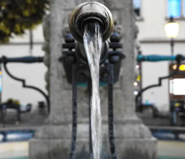 Beautiful metal faucet that gushes drinking water.