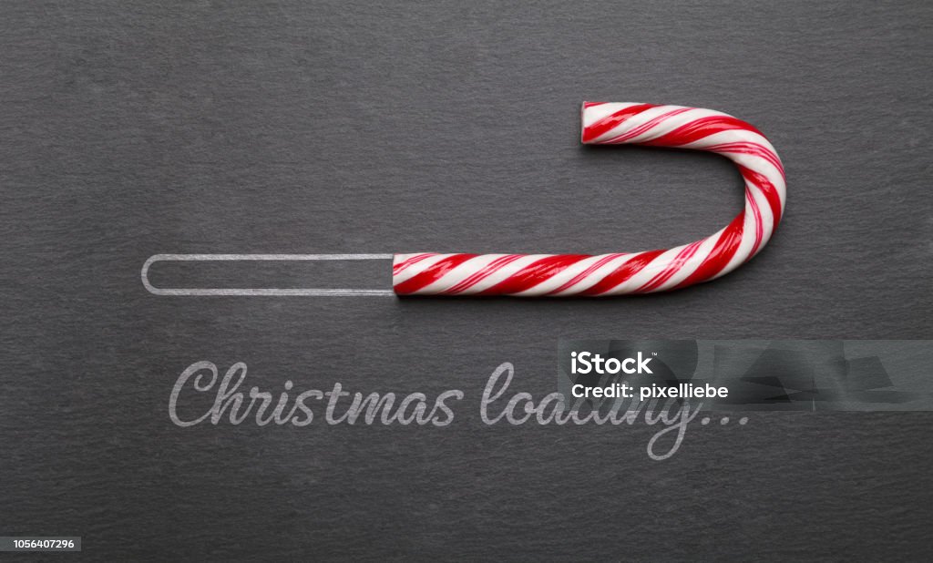 Christmas loading candy cane on blackboard Christmas Stock Photo