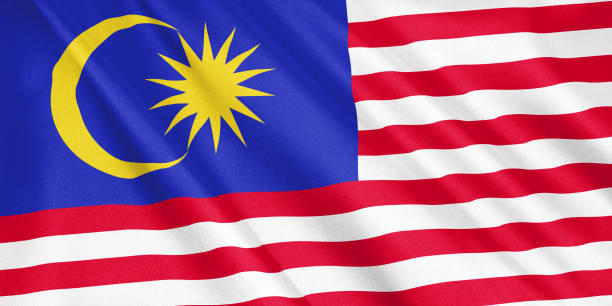 istock Malaysia flag waving with the wind, wide format, 3D illustration. 3D rendering. 1056407456