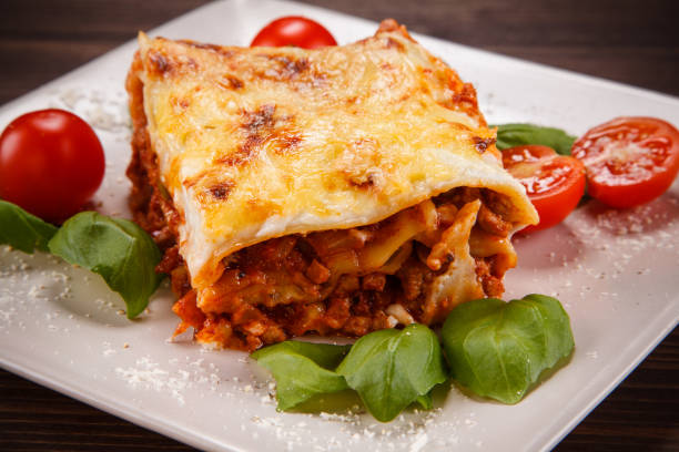 istock Lasagna on wooden table 1056407922
