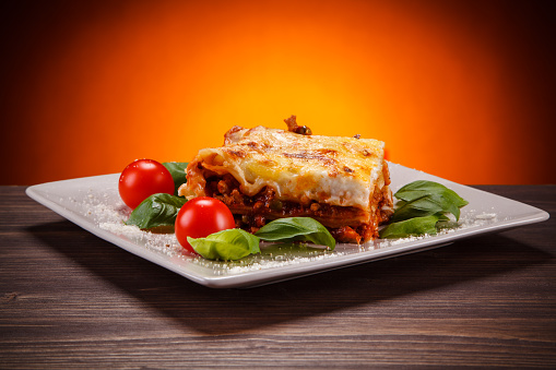 Lasagna on wooden table