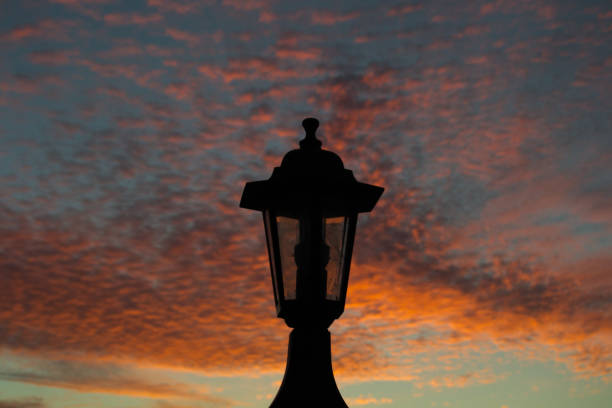 istock Silouette cityscape at sunset hour with orange sky color 1056411930