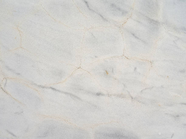 istock The texture of a light marble with veins. 1056413726