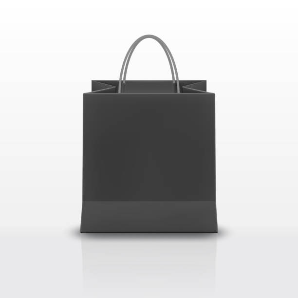 istock Realistic black Paper shopping bag with handles isolated on white background. Vector illustration 1056413910