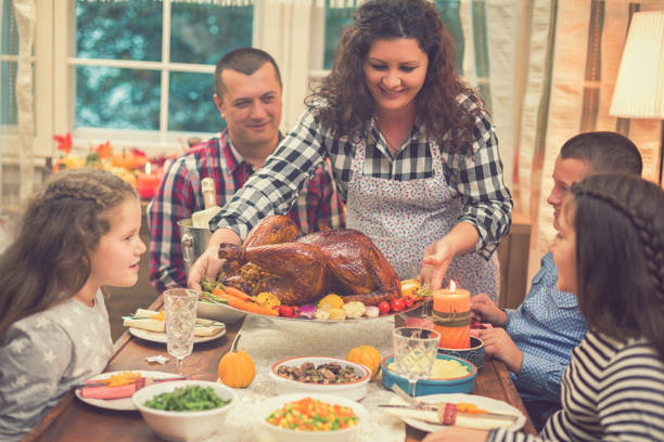 istock Serving Stuffed Turkey for Thanksgiving Day 1056417760