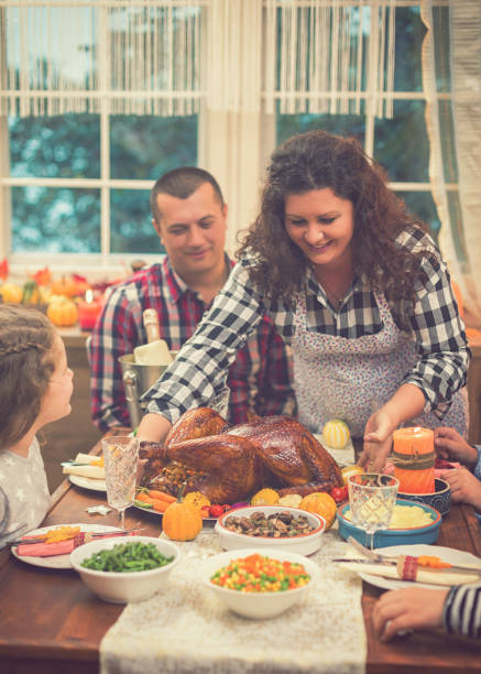istock Serving Stuffed Turkey for Thanksgiving Day 1056417914