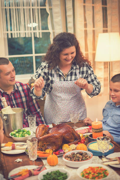 istock Serving Stuffed Turkey for Thanksgiving Day 1056419302
