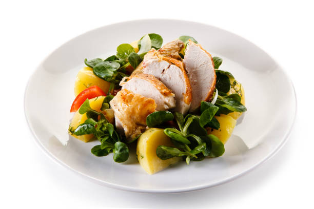 istock Grilled chicken breast and vegetables 1056419314