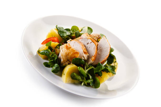 istock Grilled chicken breast and vegetables 1056419610