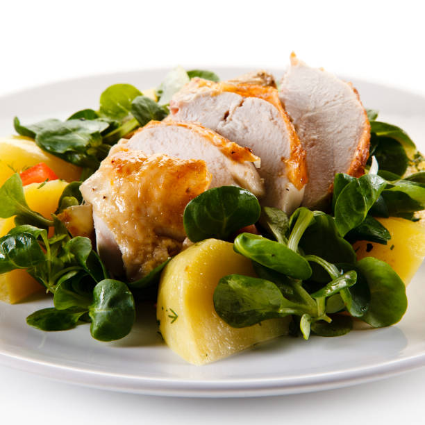 istock Grilled chicken breast and vegetables 1056419710