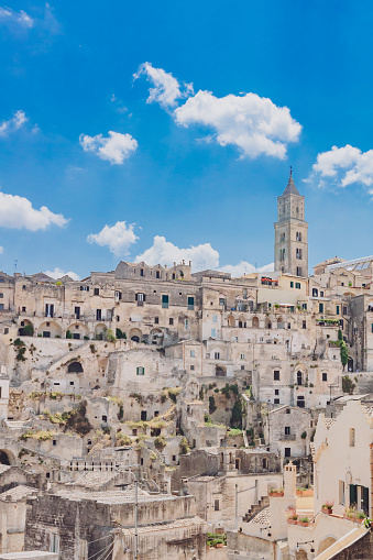 View of the sassi of Matera, Italy with bell tower of the Matera Cathedral