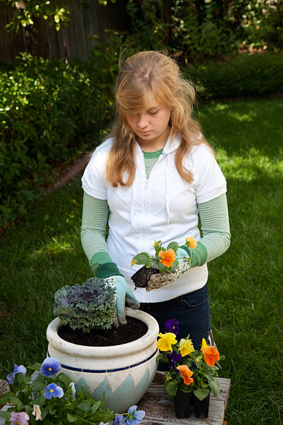 istock Teenager gardening 105642216